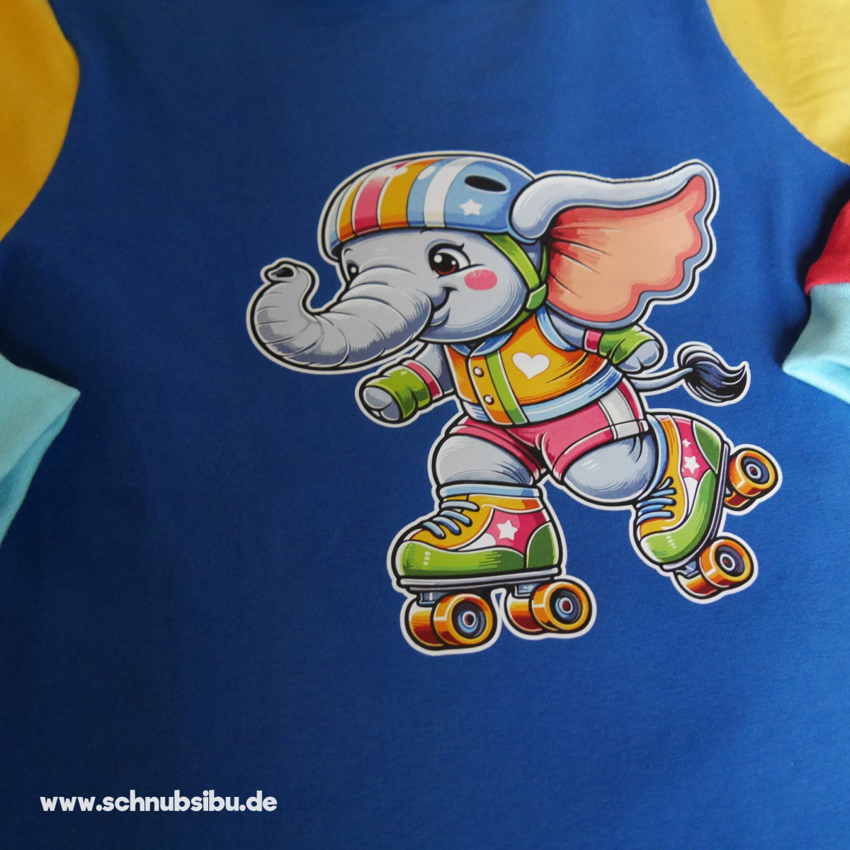 Bügelbild Elefant auf Rollschuhen